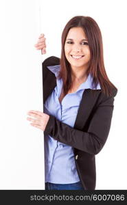 Beautiful young woman holding a white card - isolated over white