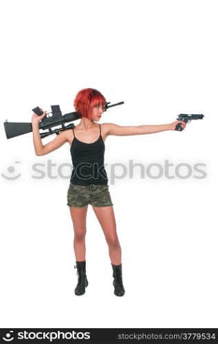 Beautiful young woman holding an automatic assault rifle and pistol