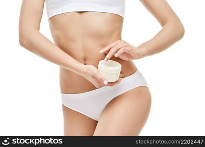 Beautiful Young Woman holding can of cream isolated on white background - Youth and Skin Care Concept.. Beautiful Young Woman holding can of cream isolated on white background - Youth and Skin Care Concept