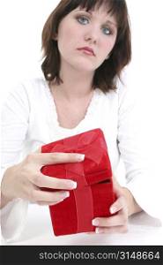 Beautiful young woman holding red gift box.