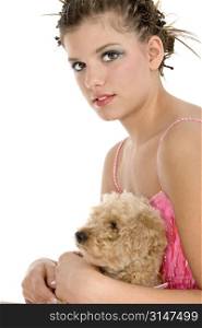 Beautiful young woman holding small dog.
