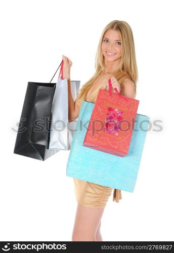 beautiful young woman in a full-length with shopping bags. Isolated on white background