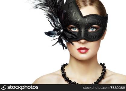 Beautiful young woman in black mysterious venetian mask. Fashion photo