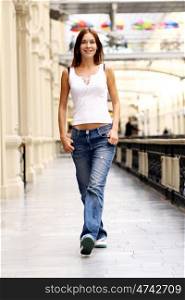 Beautiful young woman in blue jeans