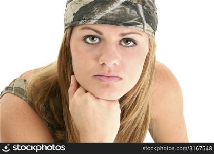 Beautiful young woman in camo rag and tank. Shot in studio over white. Stunning eyes and perfect skin.