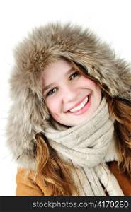 Beautiful young woman in fur hood of winter coat on white background