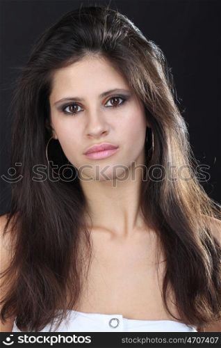 Beautiful young woman in grey background
