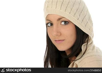 Beautiful young woman in hooded sweater over white. Shot in studio.