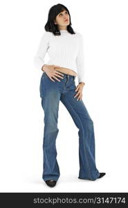 Beautiful young woman in jeans and white sweater standing, wondering. Clipping path.