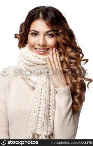 Beautiful young woman in knitted wool sweater smiling isolated on white. Beautiful young woman in knitted wool sweater smiling