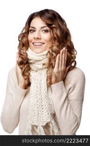Beautiful young woman in knitted wool sweater smiling isolated on white. Beautiful young woman in knitted wool sweater smiling