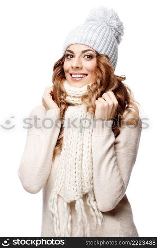 Beautiful young woman in knitted wool sweater smiling isolated on white. Beautiful young woman in knitted wool sweater smiling