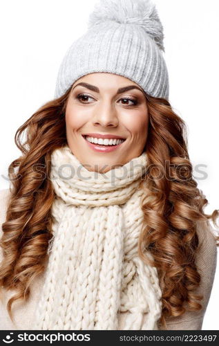 Beautiful young woman in knitted wool sweater smiling isolated on white. Beautiful young woman in knitted wool sweater smiling