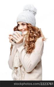 Beautiful young woman in knitted wool sweater smiling isolated on white. Beautiful young woman in knitted wool sweater smiling