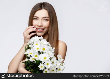 Beautiful young woman in knitted wool sweater smiling isolated on white. Beautiful young woman in knitted wool sweater smiling