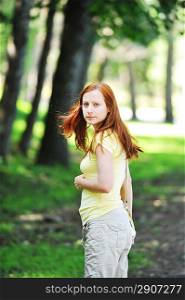 beautiful young woman in park portrait