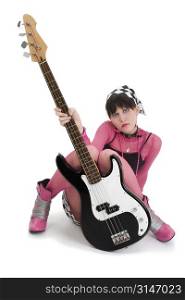 Beautiful young woman in pink and black with a 4 string bass electric. Shot in studio over white.