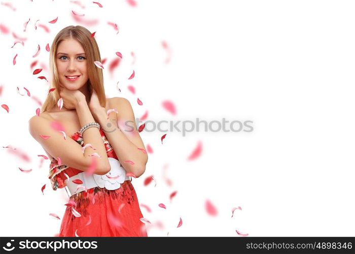 Beautiful young woman in red dress and flowers