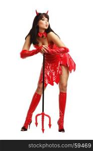 Beautiful Young Woman in Sexy Red Costume of the Hell Devil is Kissing Air and Going to Halloween or Carnival Party