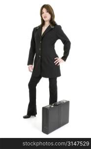Beautiful young woman in suit with briefcase. Standing over white background.