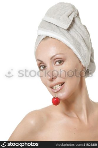 beautiful young woman in towel, with a cherry berry