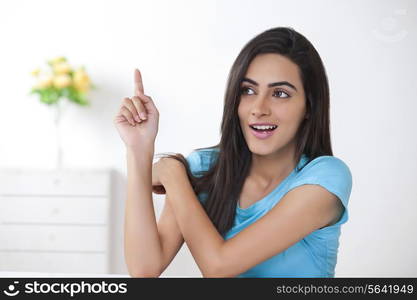 Beautiful young woman just got an idea at home