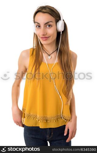 Beautiful young woman listen music with headphones, isolated on white