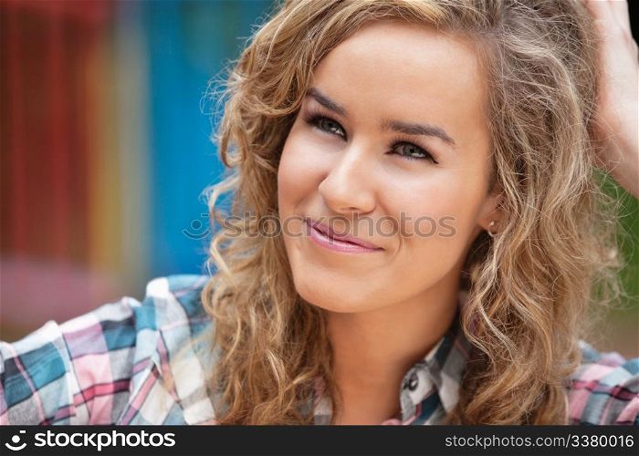 Beautiful young woman looking away and smiling
