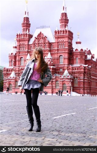 Beautiful young woman next in Red Square, Moscow