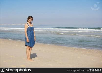 Beautiful young woman on a amazing beach