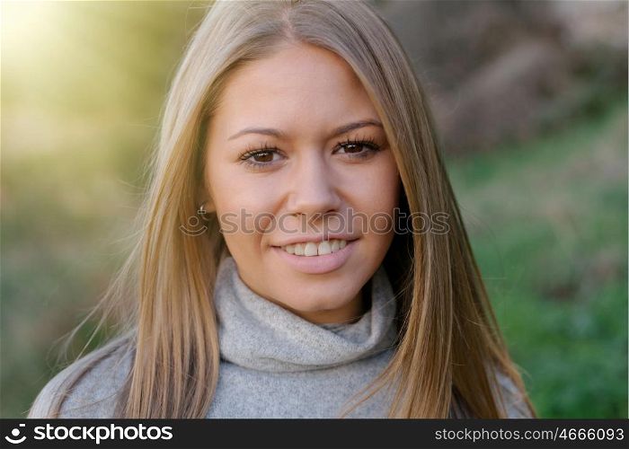 Beautiful young woman on a sunny day outside