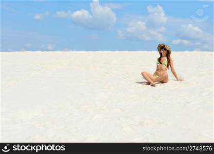 beautiful young woman on the sunny beach