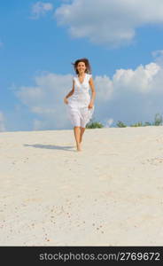 beautiful young woman on the sunny beach