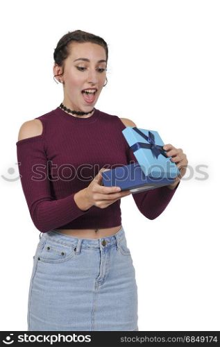 Beautiful young woman opening a gift or present. Balloons