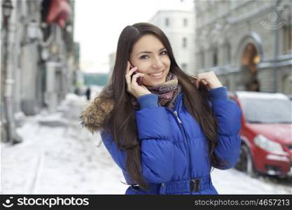 Beautiful young woman. Outdoor winter portrait