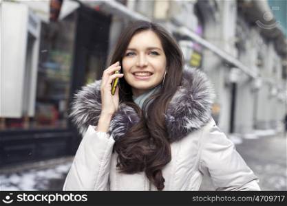 Beautiful young woman. Outdoor winter portrait