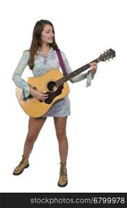 Beautiful young woman playing an acoustic guitar