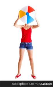 Beautiful young woman posing with a beach ball