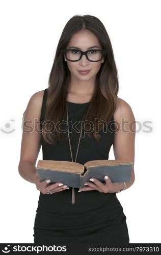 Beautiful young woman reading an interesting book