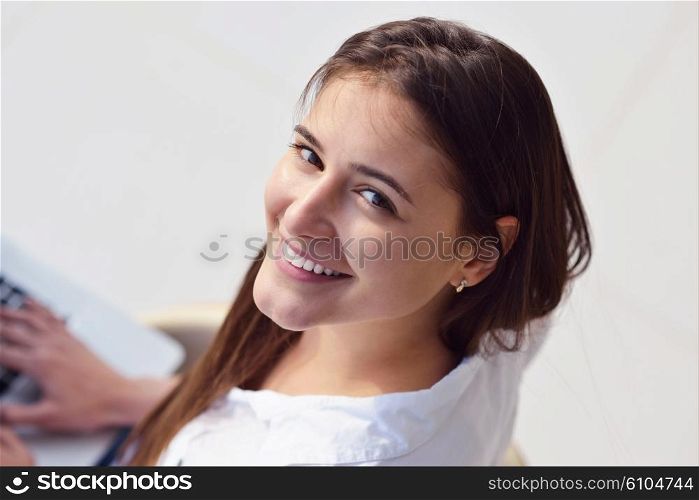 beautiful young woman relax and work on laptop computer modern home office