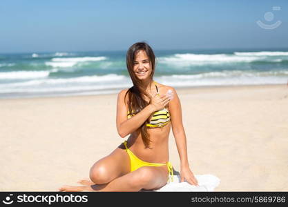 Beautiful young woman relaxing at the beach