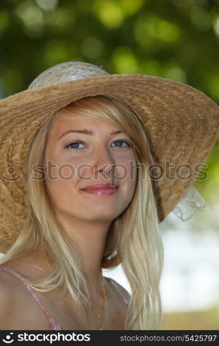 beautiful young woman relaxing in a garden