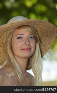 beautiful young woman relaxing in a garden