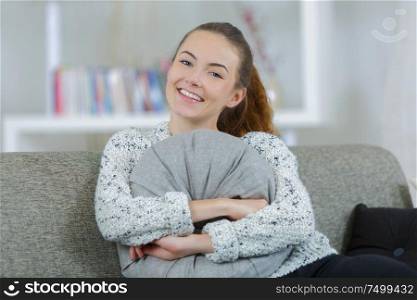 beautiful young woman relaxing on sofa