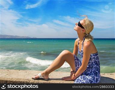 Beautiful young woman relaxing on the beach