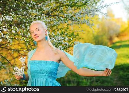 Beautiful young woman relaxing outdoors