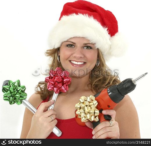 Beautiful young woman selling tools for Christmas.