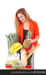 Beautiful young woman shopping at the supermarket