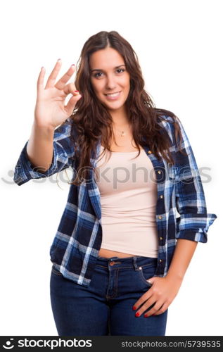 Beautiful young woman signaling ok, isolated over white