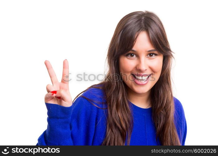 Beautiful young woman signaling ok, isolated over white